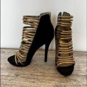 Michael Kors Black suede pumps with gold accent
